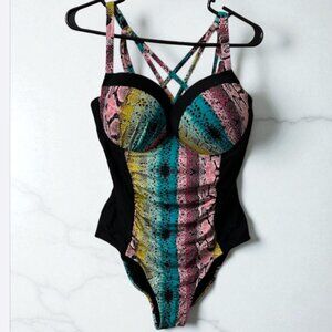 Allure women's one-piece swimsuit with crisscross straps and bright snake print
